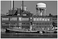 Tugboats and brick buildings, Naval Shipyard. Portsmouth, New Hampshire, USA (black and white)