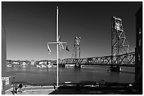Riverside plaza, flagpole, and memorial bridge. Portsmouth, New Hampshire, USA (black and white)