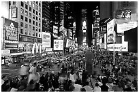 Crowds on Times Squares at night. NYC, New York, USA (black and white)