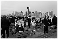 Black Tie gala guests on boat deck, New York harbor. NYC, New York, USA ( black and white)