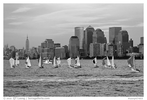 Sailboats, lower and mid Manhattan skyline. NYC, New York, USA (black and white)
