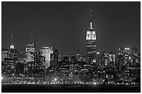 Mid-town Manhattan skyline by night. NYC, New York, USA ( black and white)