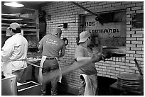 Pizza preparation, Lombardi pizzeria kitchen. NYC, New York, USA ( black and white)
