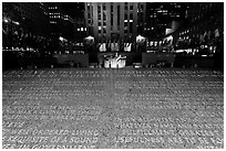Rockefeller plaza and rink by night with Credo plaque. NYC, New York, USA (black and white)