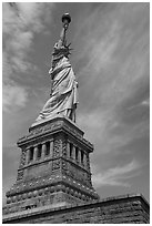 Side view of Statue of Liberty and pedestal, Statue of Liberty National Monument. NYC, New York, USA ( black and white)