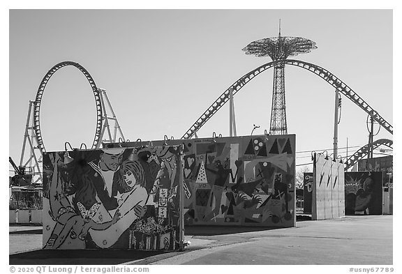 Murals and roller coaster, Coney Island. New York, USA (black and white)