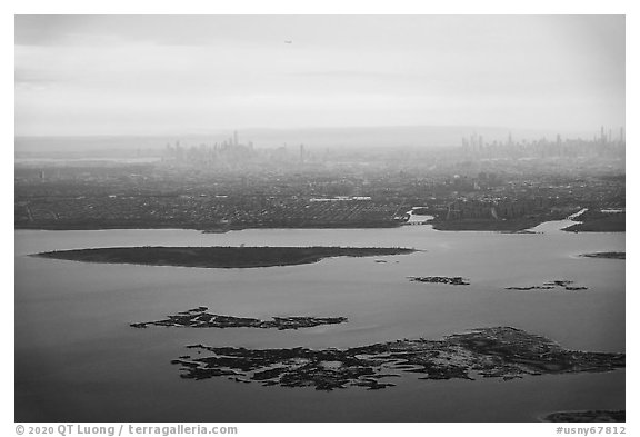 Aerial view of Jamaica Bay, Brooklyn, and Manhatta skyline. NYC, New York, USA (black and white)
