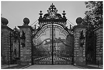 Entrance gate of the Breakers mansion at dusk. Newport, Rhode Island, USA (black and white)