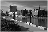 Brick buildings reflected in Seekonk river, late afternoon. Providence, Rhode Island, USA (black and white)