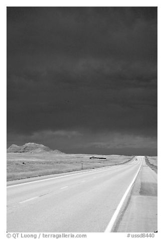 Storm cloud over road. South Dakota, USA (black and white)