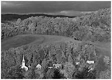 East Corinth village amongst trees in autumn color. Vermont, New England, USA ( black and white)