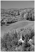 Church of East Corinth among trees in autumn color. Vermont, New England, USA ( black and white)
