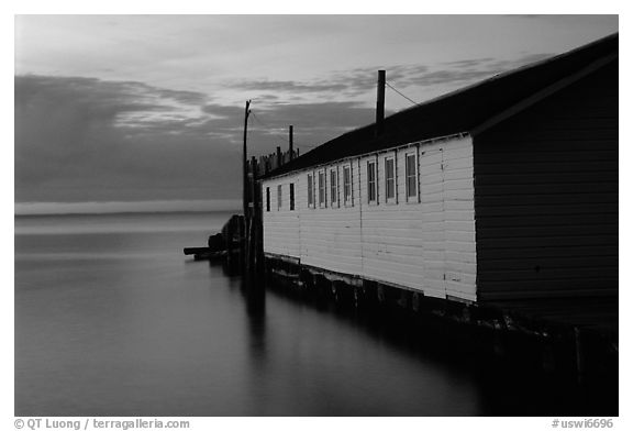 Wharf building in Lake Superior at dusk, Apostle Islands National Lakeshore. Wisconsin, USA (black and white)