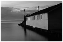 Wharf building in Lake Superior at dusk, Apostle Islands National Lakeshore. Wisconsin, USA ( black and white)