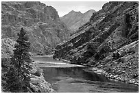 High cliffs above free-flowing part of Snake River. Hells Canyon National Recreation Area, Idaho and Oregon, USA ( black and white)