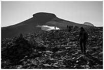 Hikers approach Table Mountain on trail, Aug 21, 2017. Jedediah Smith Wilderness,  Caribou-Targhee National Forest, Idaho, USA ( black and white)