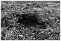 Entrance of lava tube. Craters of the Moon National Monument and Preserve, Idaho, USA ( black and white)