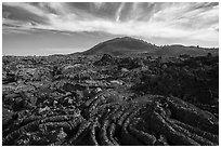 Pahoehoe lava and Big Cinder Butte. Craters of the Moon National Monument and Preserve, Idaho, USA ( black and white)