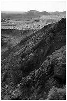 Slopes of Echo Crater and Watchman cinder cone. Craters of the Moon National Monument and Preserve, Idaho, USA ( black and white)
