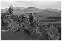 Colorful lava rocks of Echo Crater, Big Cinder Butte, and Pioneer Mountains. Craters of the Moon National Monument and Preserve, Idaho, USA ( black and white)