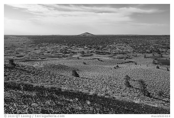 Red cinders of Echo Crater, Big Cinder Butte, and Pioneer Mountains. Craters of the Moon National Monument and Preserve, Idaho, USA (black and white)