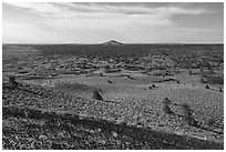 Red cinders of Echo Crater, Big Cinder Butte, and Pioneer Mountains. Craters of the Moon National Monument and Preserve, Idaho, USA ( black and white)