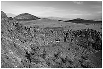 Walls of Echo Crater, Big Cinder Butte, Coyotte Butte, and Half Cone. Craters of the Moon National Monument and Preserve, Idaho, USA ( black and white)