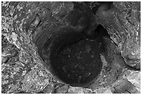 Trunk-shaped depression in lava. Craters of the Moon National Monument and Preserve, Idaho, USA ( black and white)
