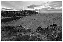 Laidlaw Kipuka from Lava Point at sunrise. Craters of the Moon National Monument and Preserve, Idaho, USA ( black and white)