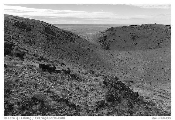 Bear Den Butte with breach in crater. Craters of the Moon National Monument and Preserve, Idaho, USA (black and white)
