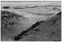 Lava rocks on breach of Bear Den Butte crater. Craters of the Moon National Monument and Preserve, Idaho, USA ( black and white)