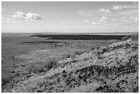 Grassy lava flow from Bear Den Butte. Craters of the Moon National Monument and Preserve, Idaho, USA ( black and white)