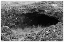 Bear Trap Cave entrance. Craters of the Moon National Monument and Preserve, Idaho, USA ( black and white)