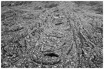 Pahoehoe lava cascades from Pilar Butte. Craters of the Moon National Monument and Preserve, Idaho, USA ( black and white)