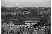 Moonrise over pinnacles and river. Upper Missouri River Breaks National Monument, Montana, USA ( black and white)