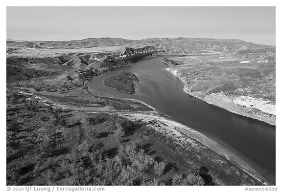 Aerial view of Cottonwoods and cliff near Slaughter River Camp. Upper Missouri River Breaks National Monument, Montana, USA (black and white)
