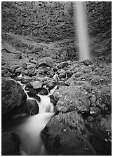 Mossy boulders and Watson Falls. Oregon, USA (black and white)
