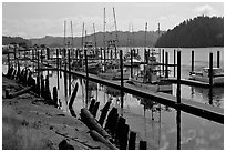 Boats along Siuslaw River, Florence. Oregon, USA (black and white)