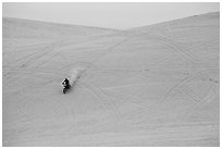 Motorcyle down dune, Oregon Dunes National Recreation Area. Oregon, USA (black and white)