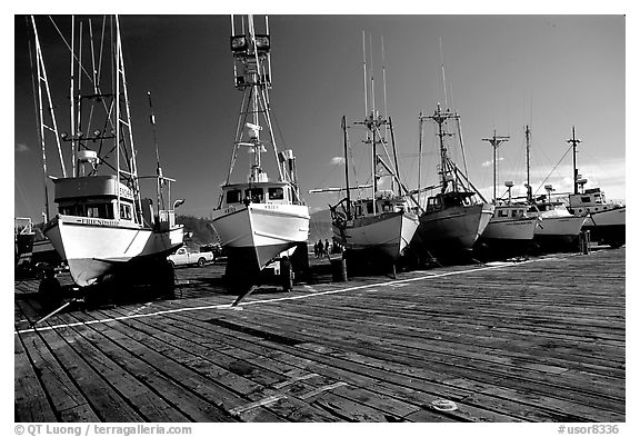 Boats on the dry deck of Port Orford. Oregon, USA (black and white)