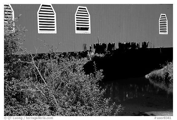 Detail of red covered bridge and river, Willamette Valley. Oregon, USA (black and white)