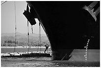 Cargo ship loading floated timber, Coos Bay. Oregon, USA (black and white)