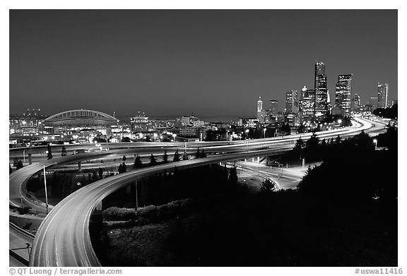 Seattle skyline, Qwest Field and freeways at dawn. Seattle, Washington
