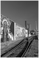 Railroad, mural, and high-rise towers. Seattle, Washington (black and white)