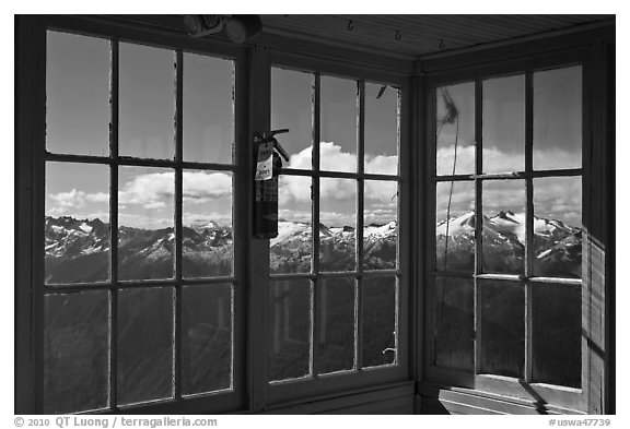 Mountains seen through windows of Hidden Lake Lookout. Washington (black and white)