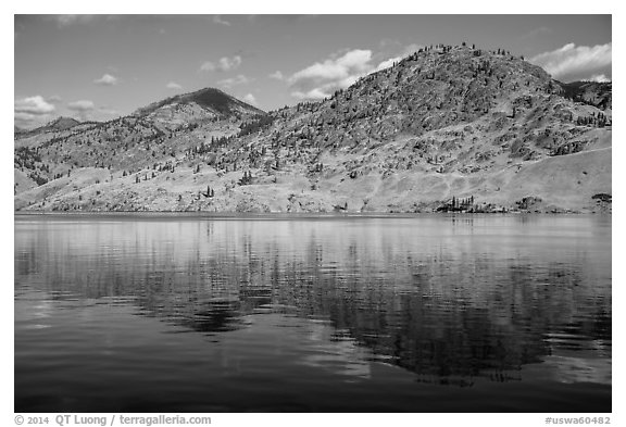 Dry hills reflected in Lake Chelan. Washington (black and white)