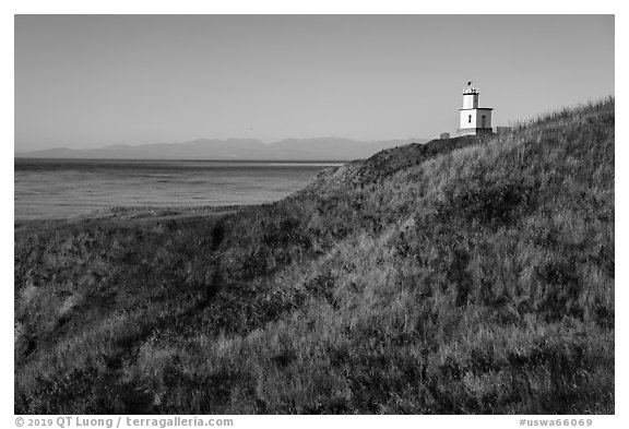 Grassy hill with lighthouse, Cattle Point Natural Resources Conservation Area, San Juan Islands National Monument. Washington (black and white)