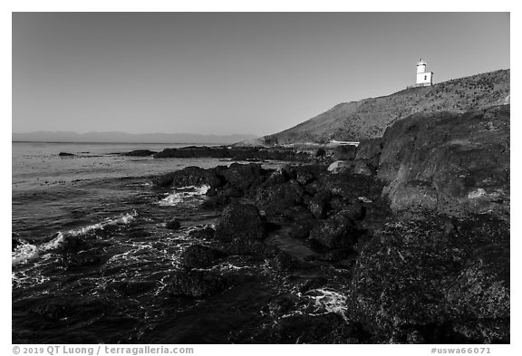 Rocky coastline and Cattle Point Lighthouse, San Juan Islands National Monument, San Juan Island. Washington (black and white)