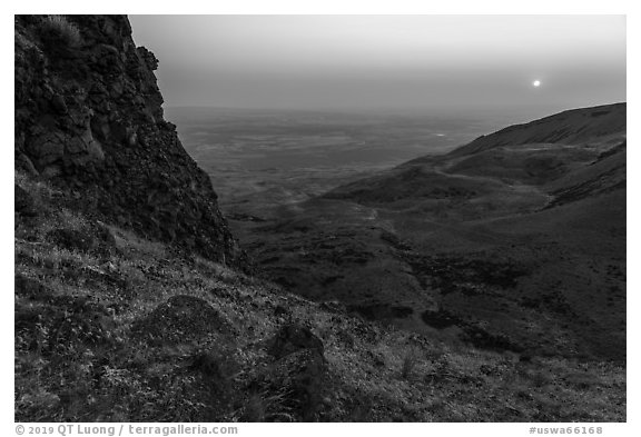 Volcanic outcrop and rising sun, Saddle Mountain, Hanford Reach National Monument. Washington (black and white)