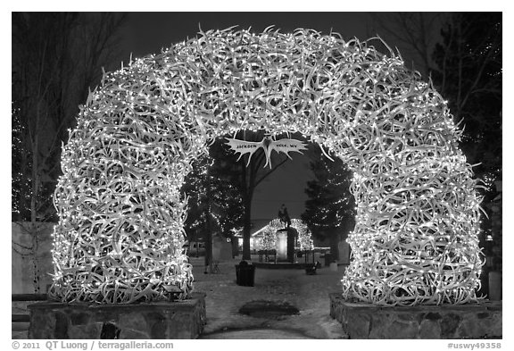 Arch of shed elk antlers at night. Jackson, Wyoming, USA (black and white)